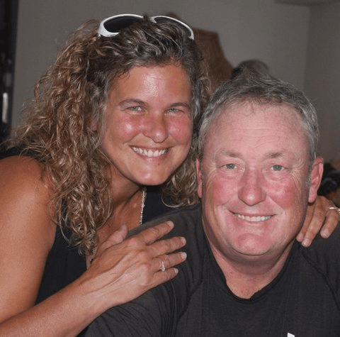 Kevin and Jen Lavers, owners of Merland Park Resort embracing and smiling.